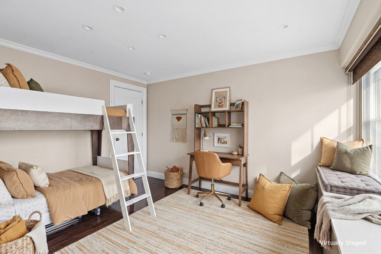 118 East 60th Street, Unit 8CD Manhattan, NY 10022 - Photo 5 of 10 a bedroom with a bed and a chair