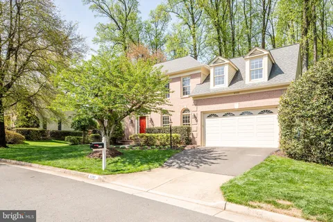 a view of a patio with a table and chairs