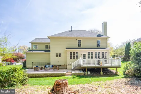 a living room with furniture rug and window