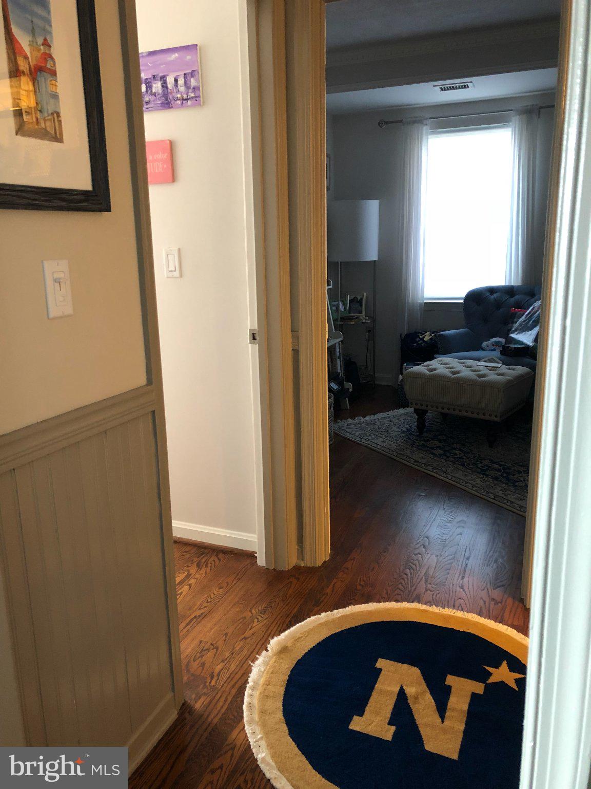 545 East Braddock Road, Unit 101 Alexandria, VA 22314 - Photo 23 of 46 Inviting hallway with cozy charm.