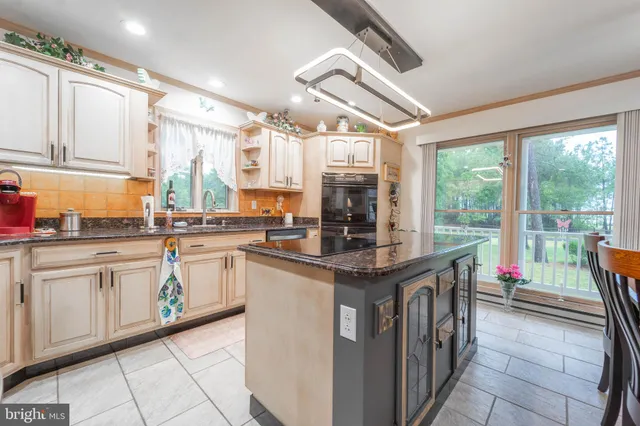 a bathroom with a tub and shower