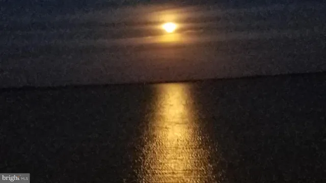 a view of a lake from a balcony