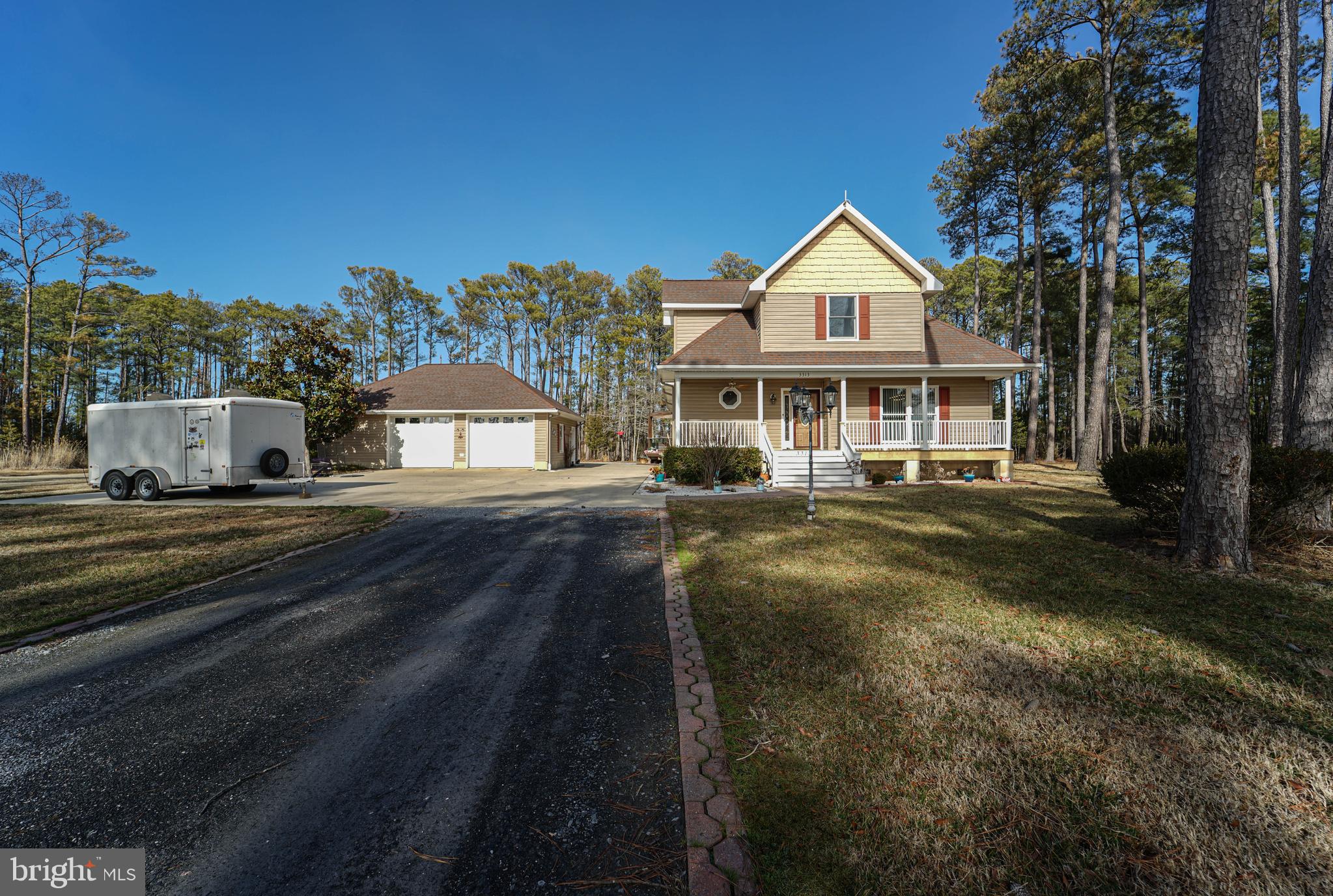 3313 Belfiore Road Church Creek, MD 21622 - Photo 5 of 70 a front view of a house with a yard