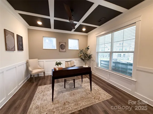 a bathroom with a sink toilet a mirror and shower