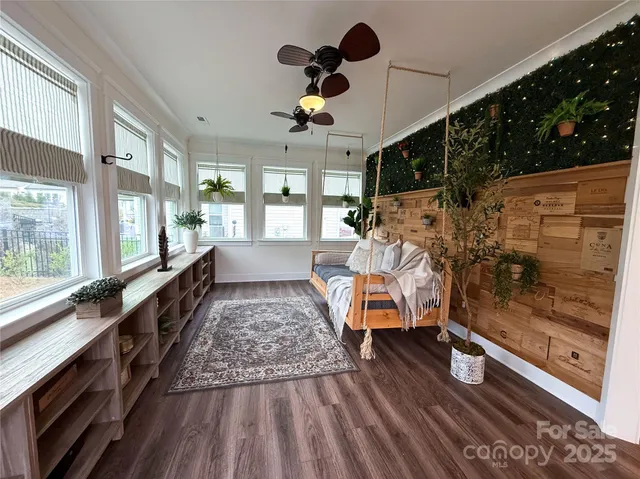 a bathroom with a double vanity sink toilet mirror and bathtub