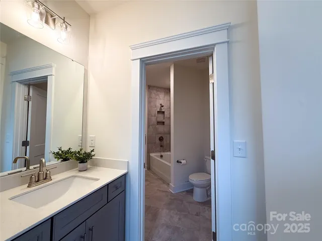 a view of a house with a street