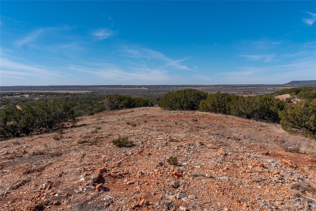 T3 County Road 175 Winters, TX 79567 - Photo 15 of 27 a view of a dry yard with wooden fence