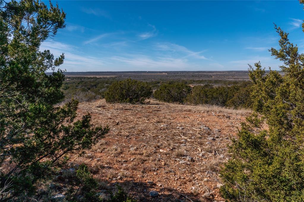 T3 County Road 175 Winters, TX 79567 - Photo 5 of 27 a view of a yard with a mountain