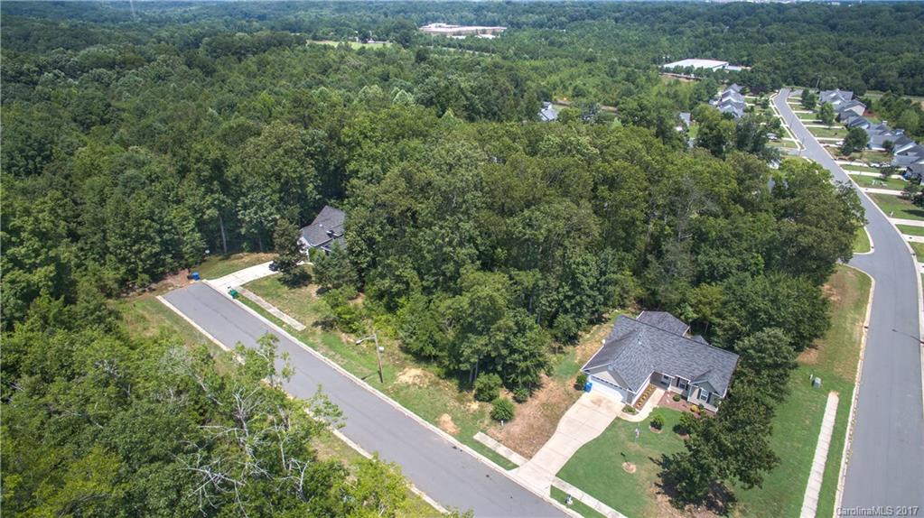 0 Sapphire Road, Unit 22 Albemarle, NC 28001 - Photo 2 of 9 an aerial view of residential house with outdoor space and trees all around