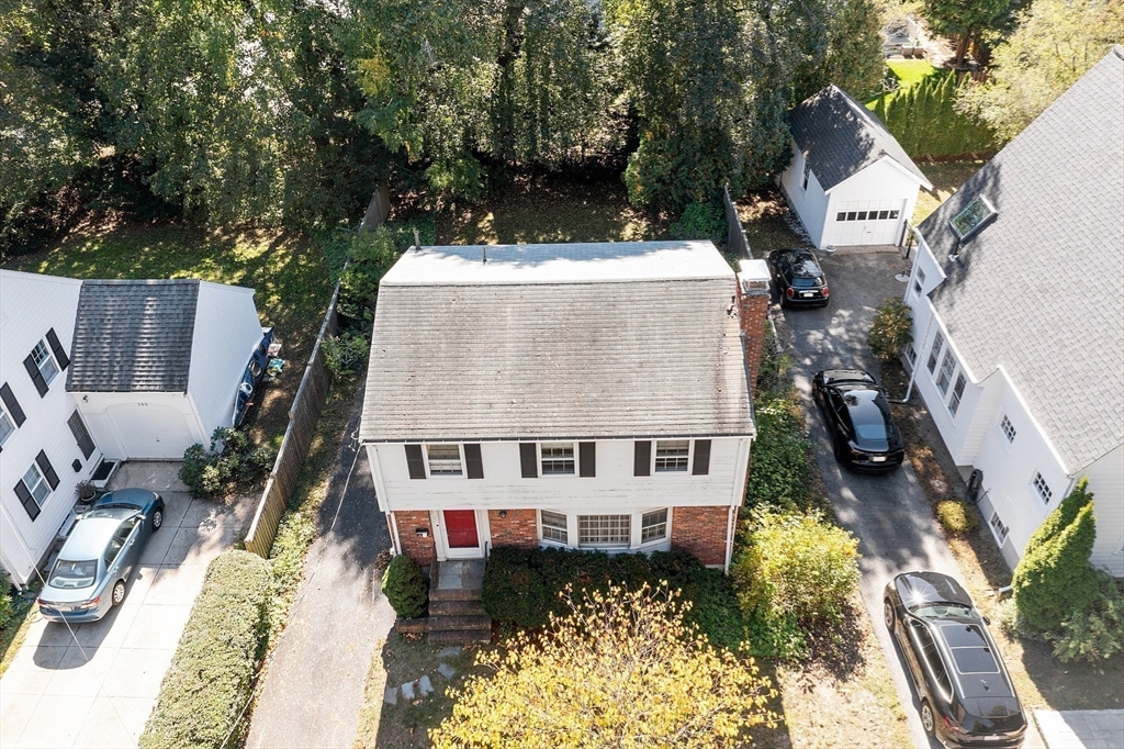 103 North Hancock Street Lexington, MA 02420 - Photo 17 of 18 an aerial view of a house with yard and patio