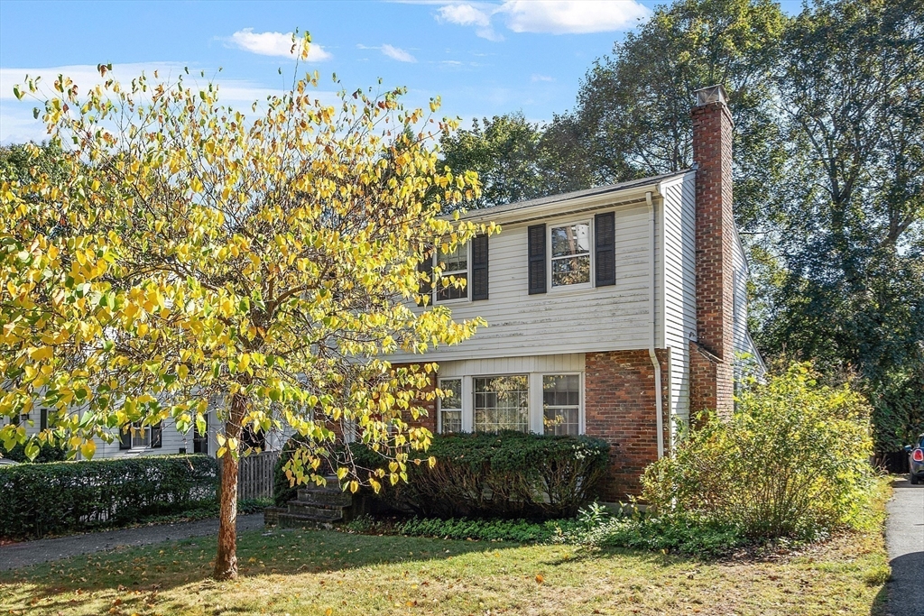 103 North Hancock Street Lexington, MA 02420 - Photo 18 of 18 a front view of a house with trees