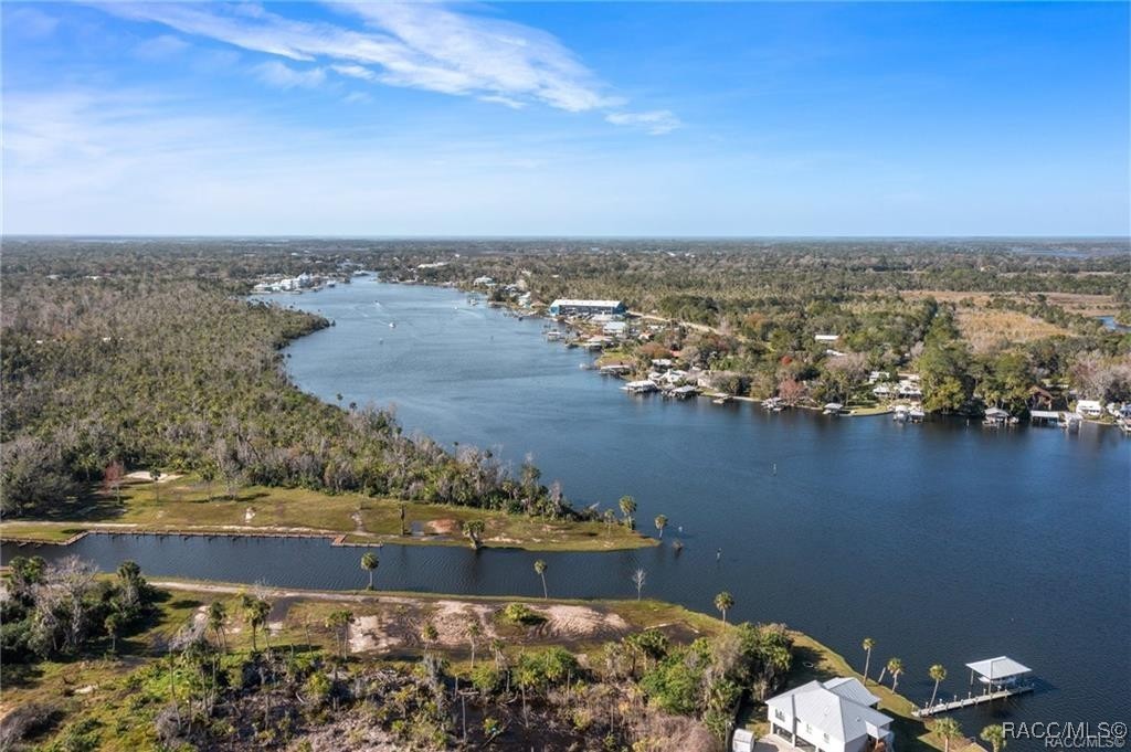 4865 South Tromp Loop Homosassa, FL 34448 - Photo 30 of 30 an aerial view of a house with a lake view