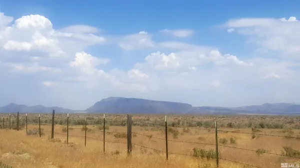 a view of lake and mountain
