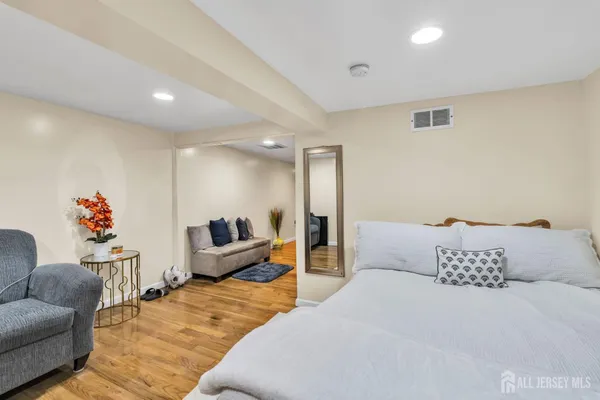 a bedroom with furniture and a couch