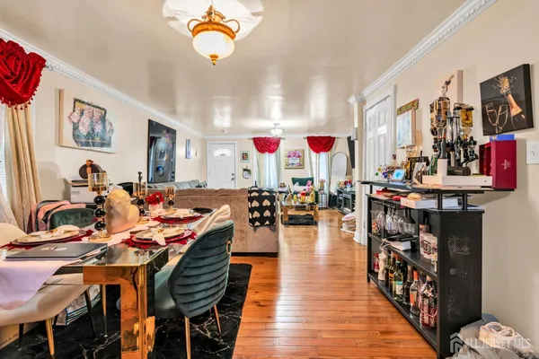 a very nice looking living room with furniture and a flat screen tv