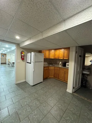 a view of a kitchen with a sink