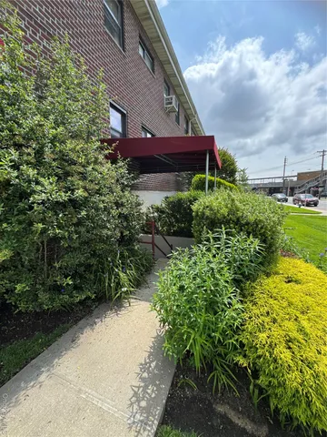 a view of a house with a garden