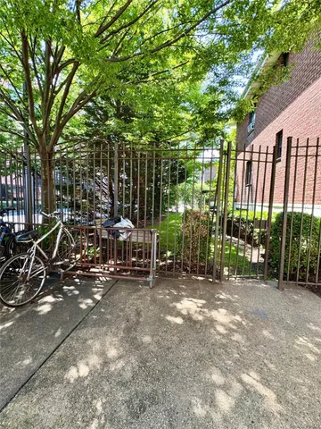 a utility room with lots of furniture and a shower