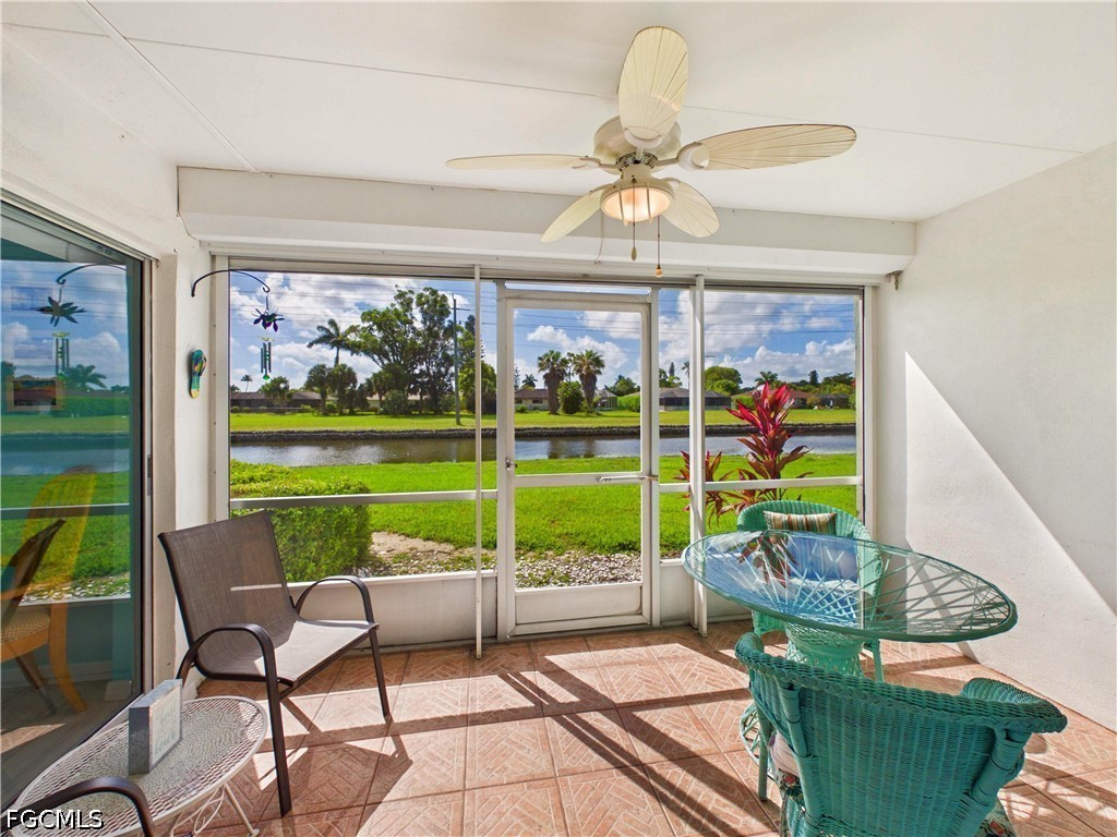 300 Valley Stream Drive, Unit 3D Naples, FL 34113 - Photo 18 of 21 a view of a porch with furniture and garden