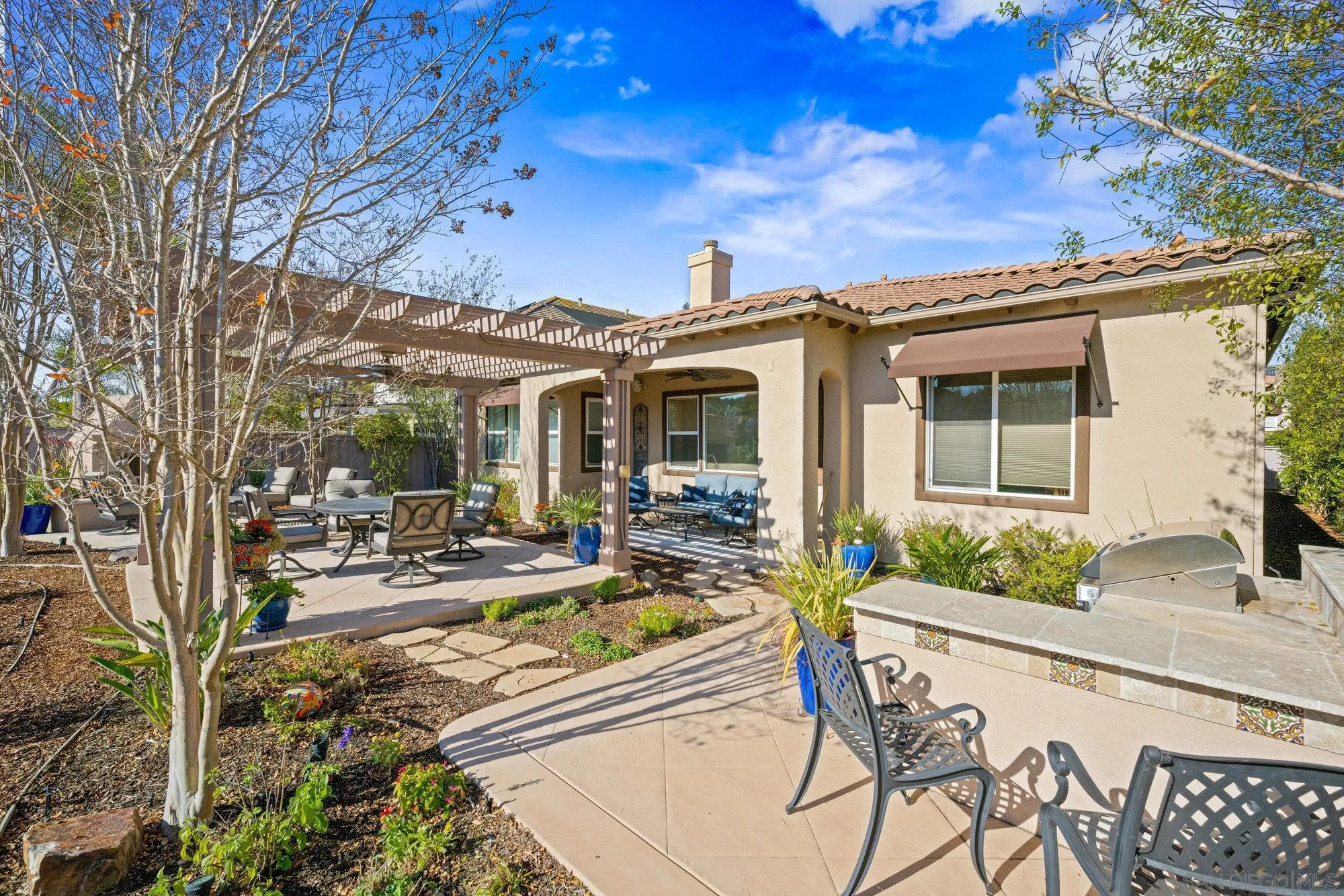 3267 Avenida Aragon Carlsbad, CA 92009 - Photo 6 of 11 front view of house with a patio