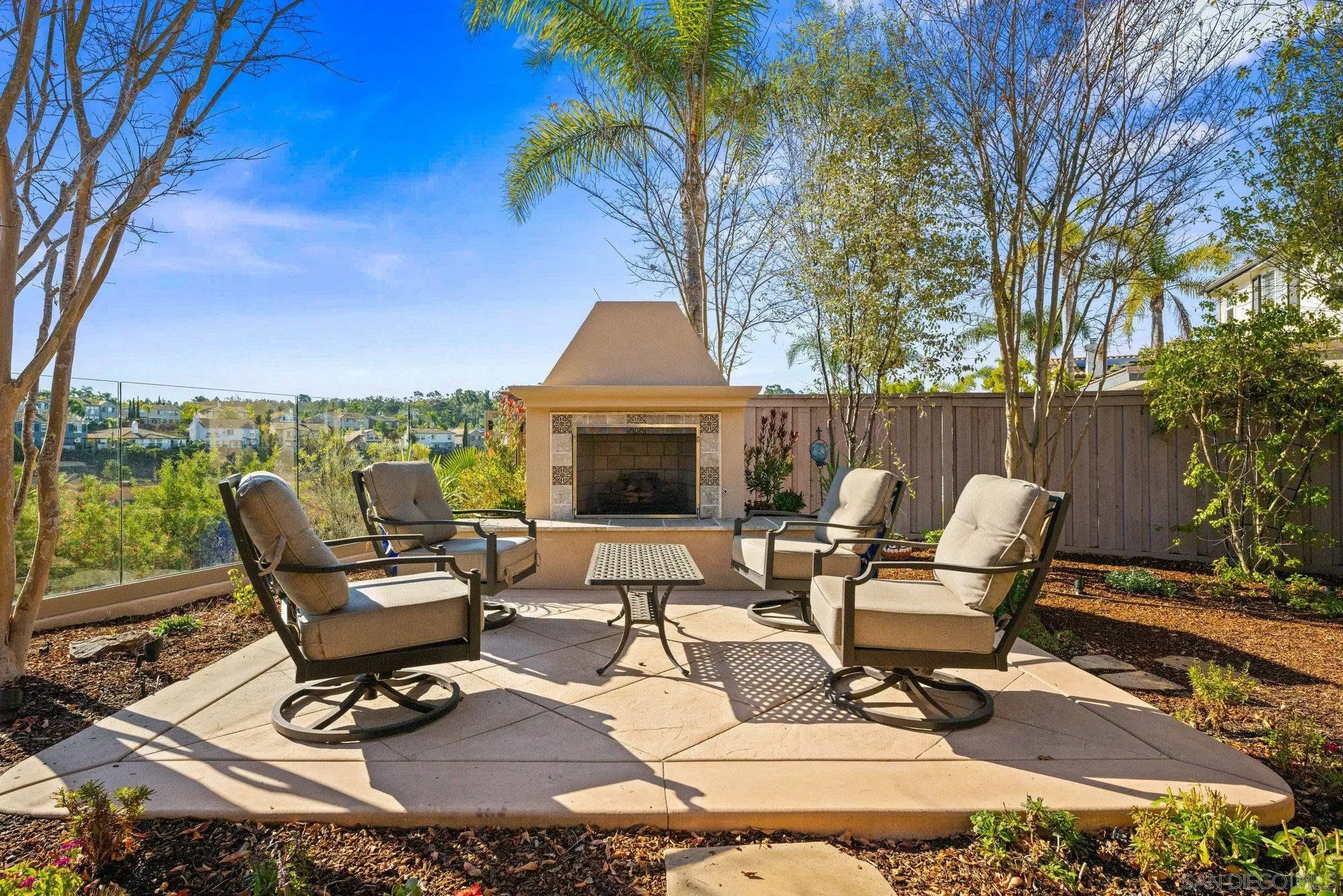 3267 Avenida Aragon Carlsbad, CA 92009 - Photo 7 of 11 a view of a chairs and table in patio