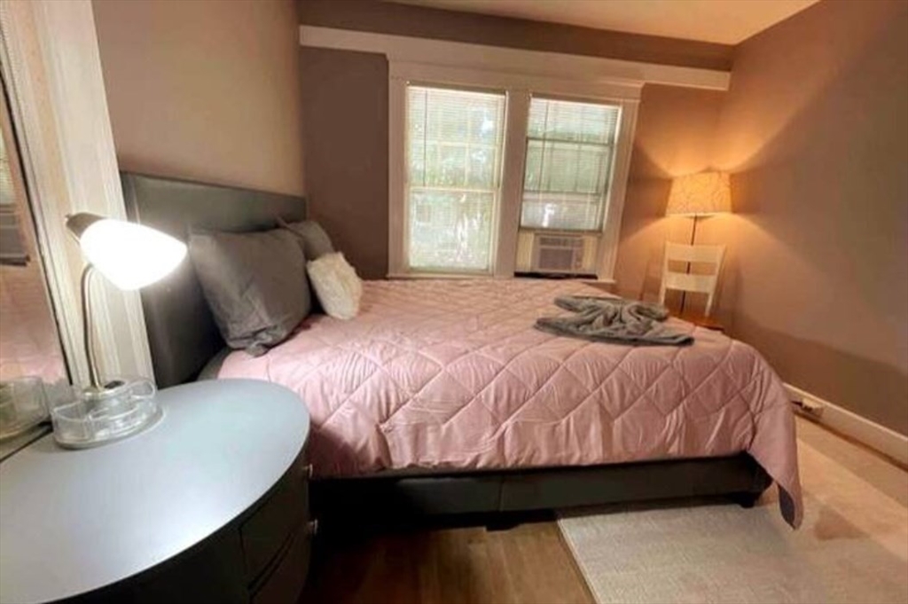 35 Iowa Street Worcester, MA 01602 - Photo 16 of 25 a bedroom with a bed and window