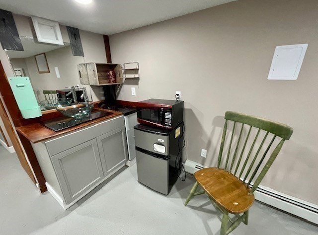 35 Iowa Street Worcester, MA 01602 - Photo 19 of 25 a kitchen with a stove and a refrigerator