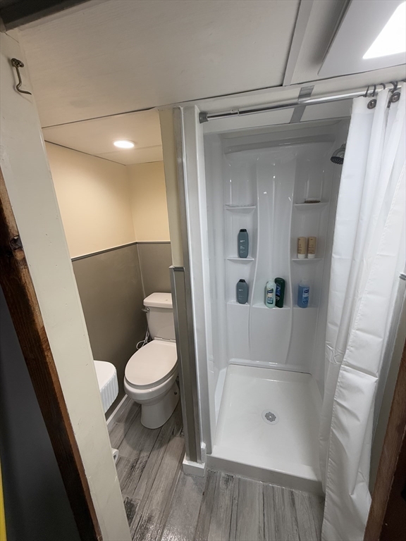 35 Iowa Street Worcester, MA 01602 - Photo 21 of 25 a bathroom with a toilet and a shower