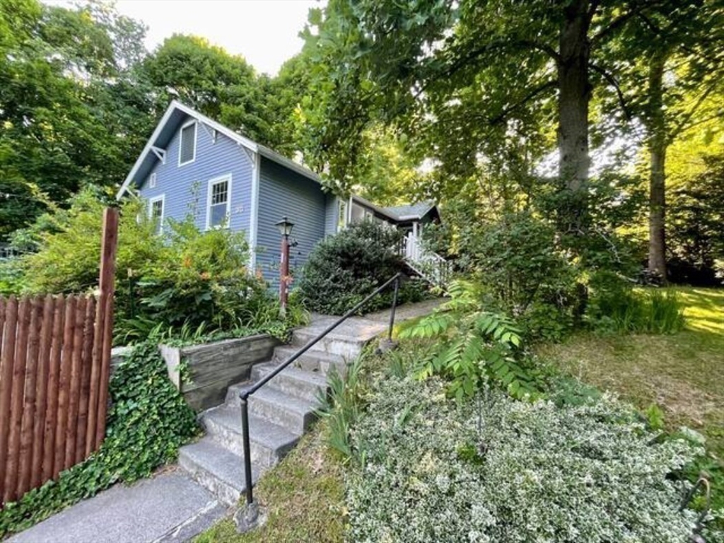 35 Iowa Street Worcester, MA 01602 - Photo 23 of 25 a house that has a tree in it