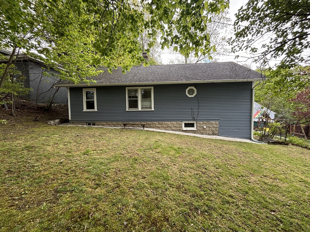 35 Iowa Street Worcester, MA 01602 - Photo 24 of 25 a front view of house with yard