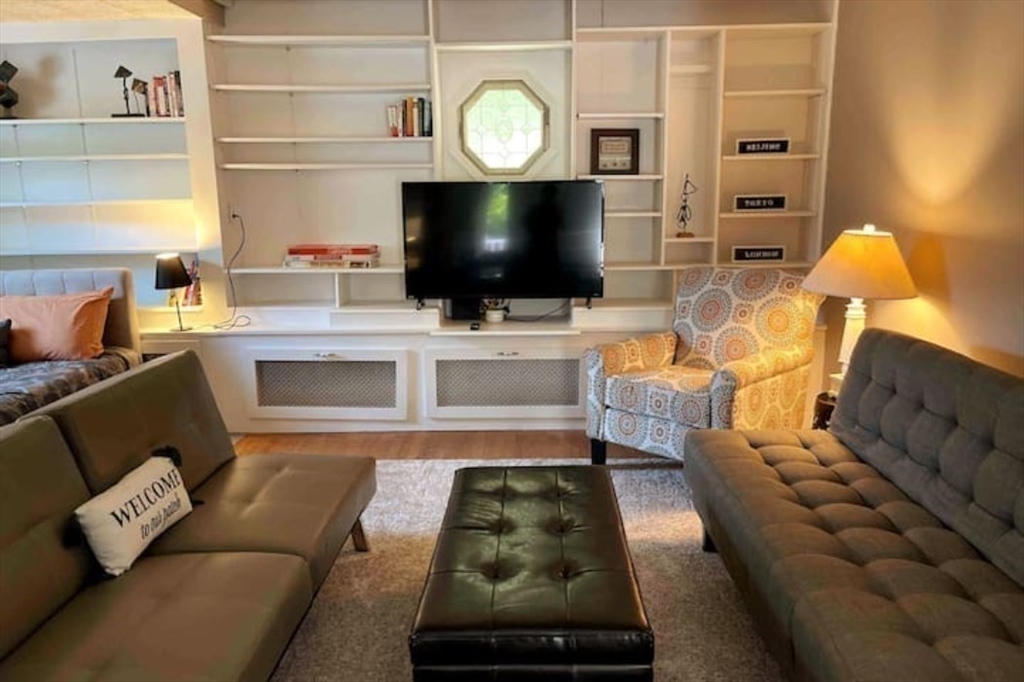 35 Iowa Street Worcester, MA 01602 - Photo 3 of 25 a living room with furniture and a flat screen tv