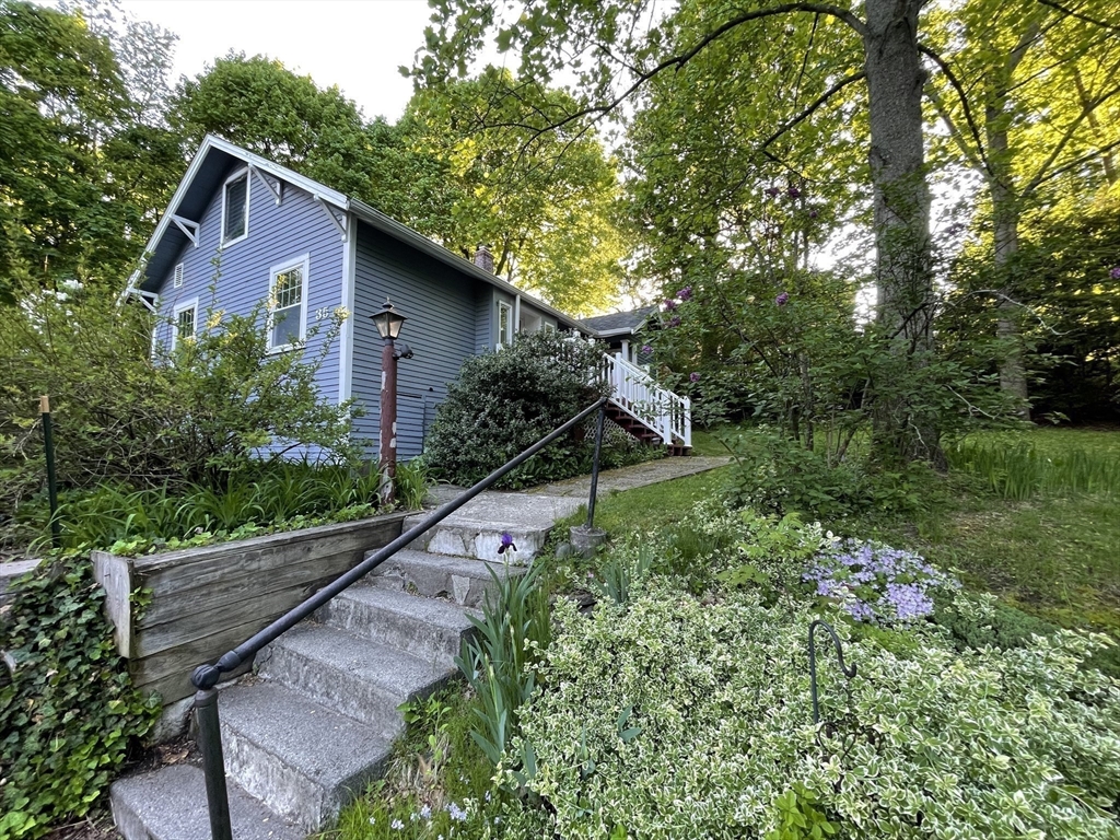 35 Iowa Street Worcester, MA 01602 - Photo 6 of 25 a house with trees in the background