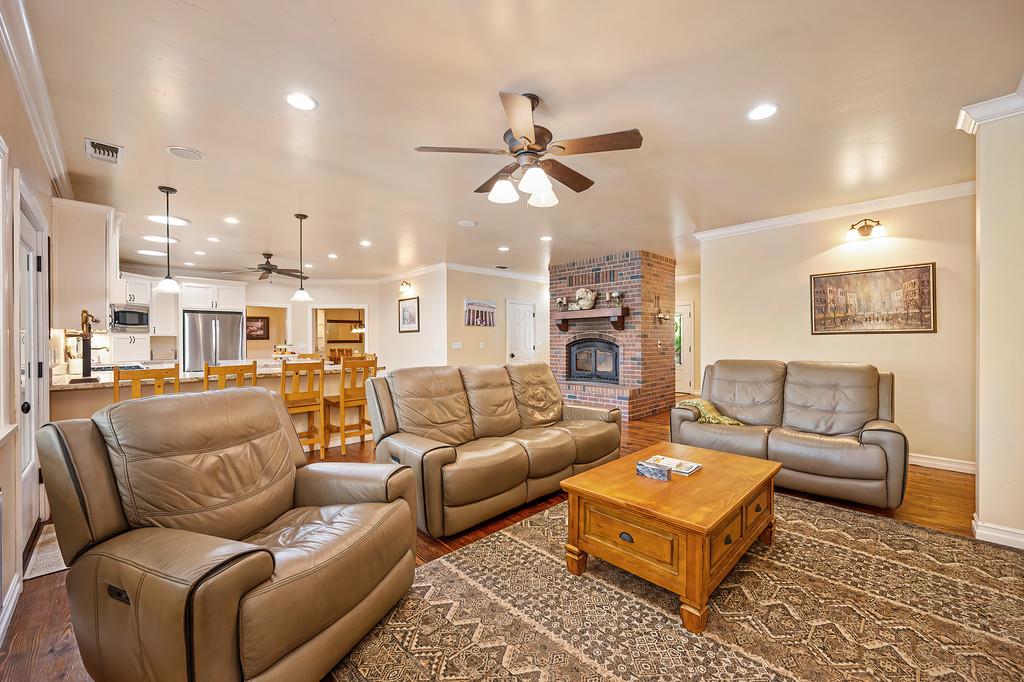 3557 Val Verde Road Loomis, CA 95650 - Photo 8 of 71 a living room with furniture ceiling fan and a rug