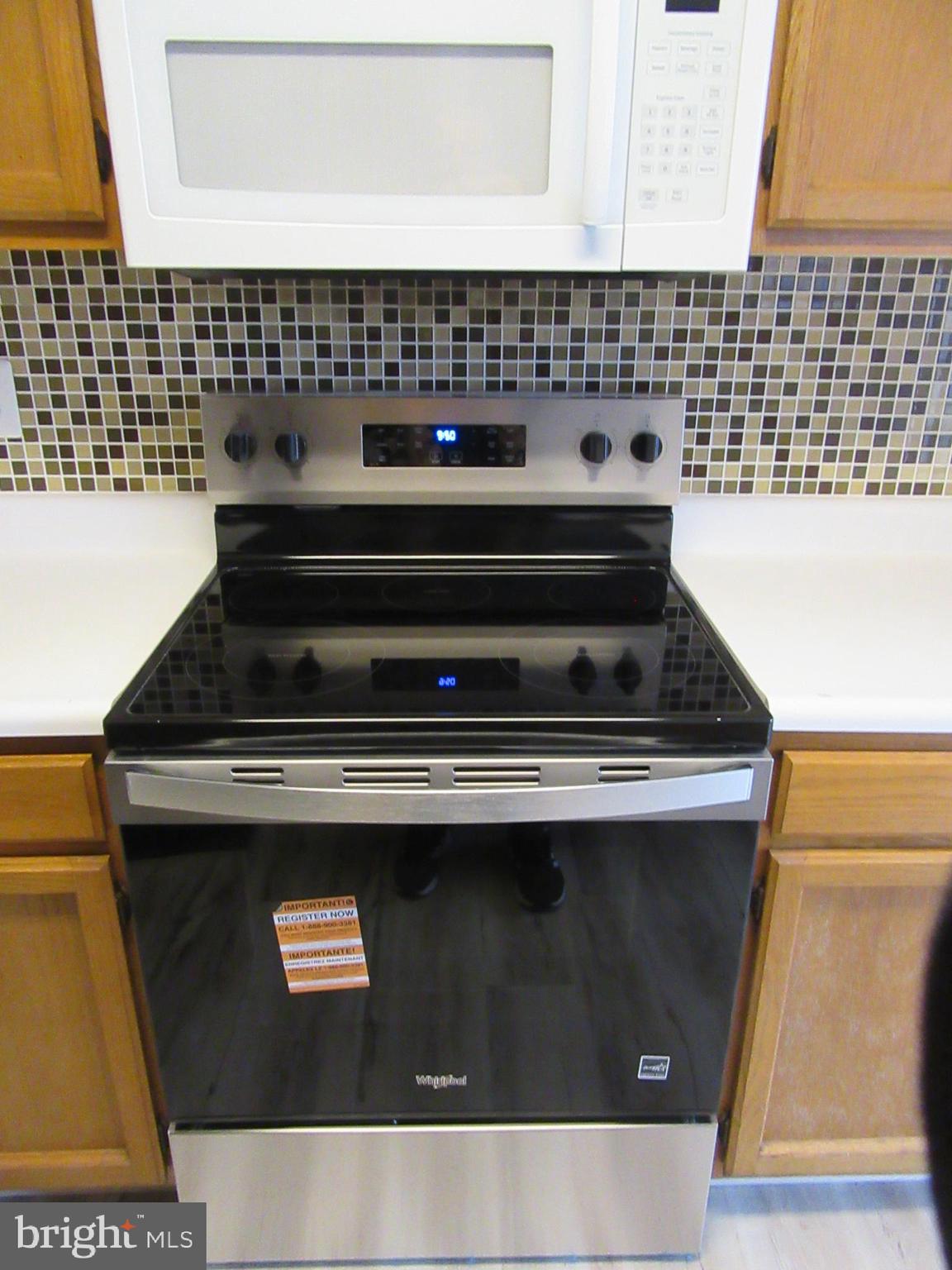 11006 Koman Circle, Unit 104 Manassas, VA 20109 - Photo 12 of 39 Brand new electric flat top stove