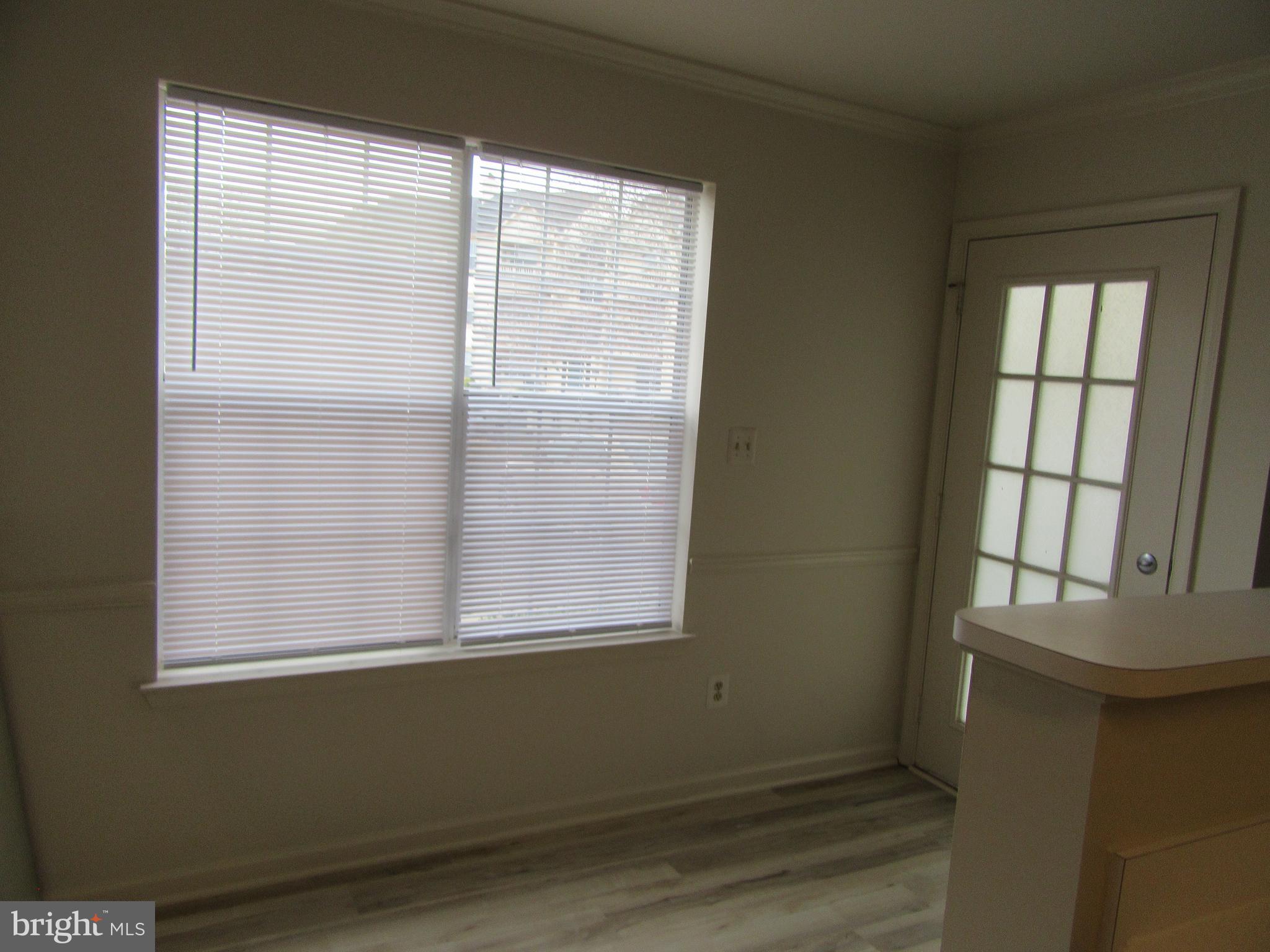 11006 Koman Circle, Unit 104 Manassas, VA 20109 - Photo 15 of 39 Eat in kitchen and entry door