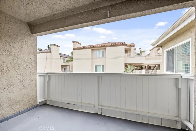 a bathroom with a sink mirror toilet and bathtub