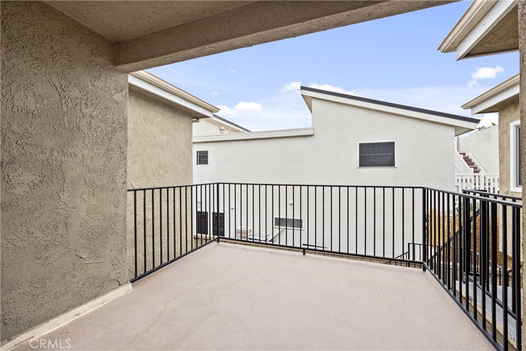 114 10th Street, Unit C Huntington Beach, CA 92648 - Photo 6 of 21 a view of a balcony