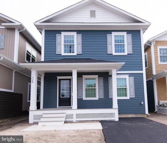 a front view of a house with a garage