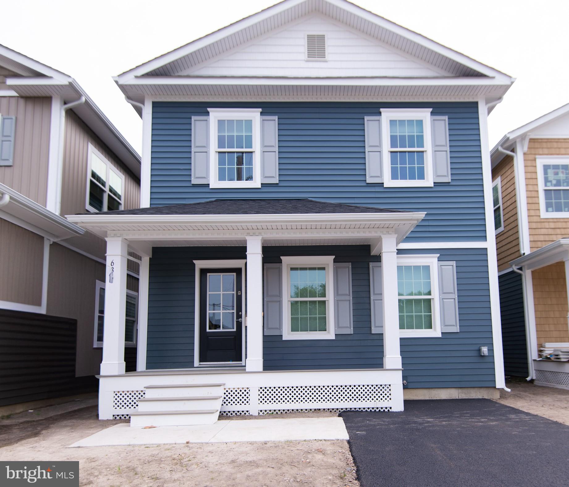 a front view of a house with a garage