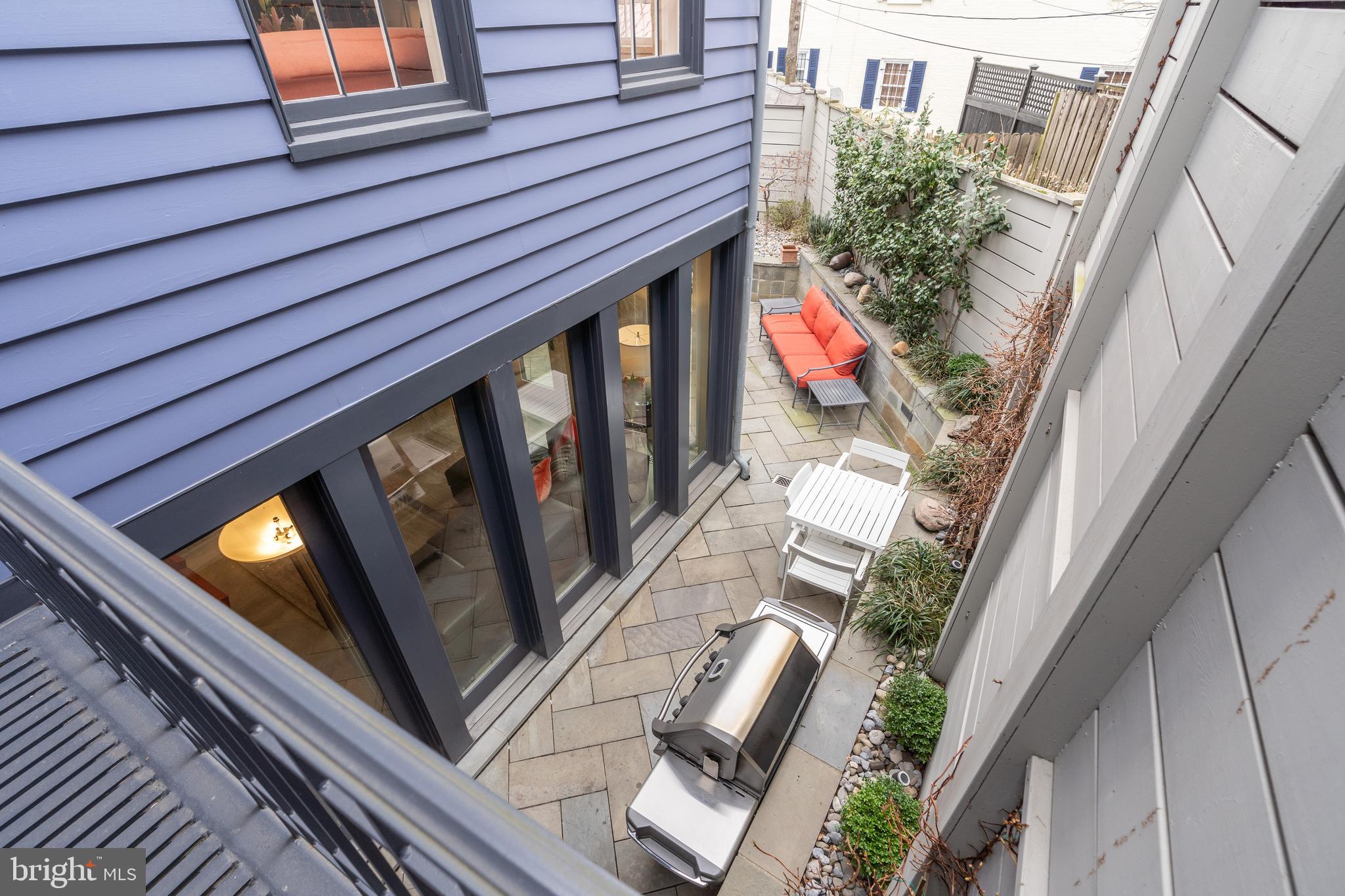 1507 33rd Street Northwest Washington, DC 20007 - Photo 14 of 42 BALCONY WITH FAMILY ROOM AND GARDEN VIEWS