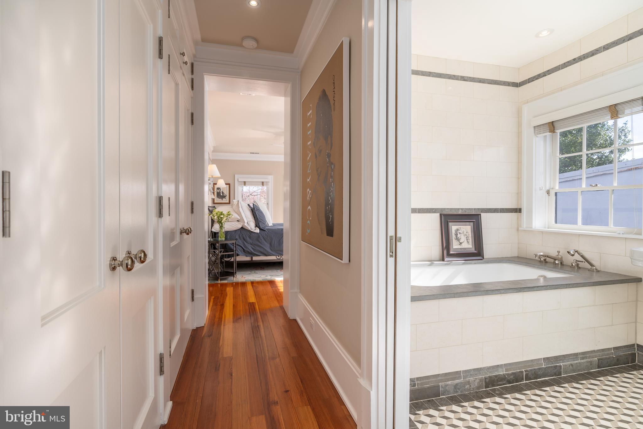 1507 33rd Street Northwest Washington, DC 20007 - Photo 29 of 42 SECOND LEVEL HALL TO PRIMARY AND ENSUITE BATHROOM