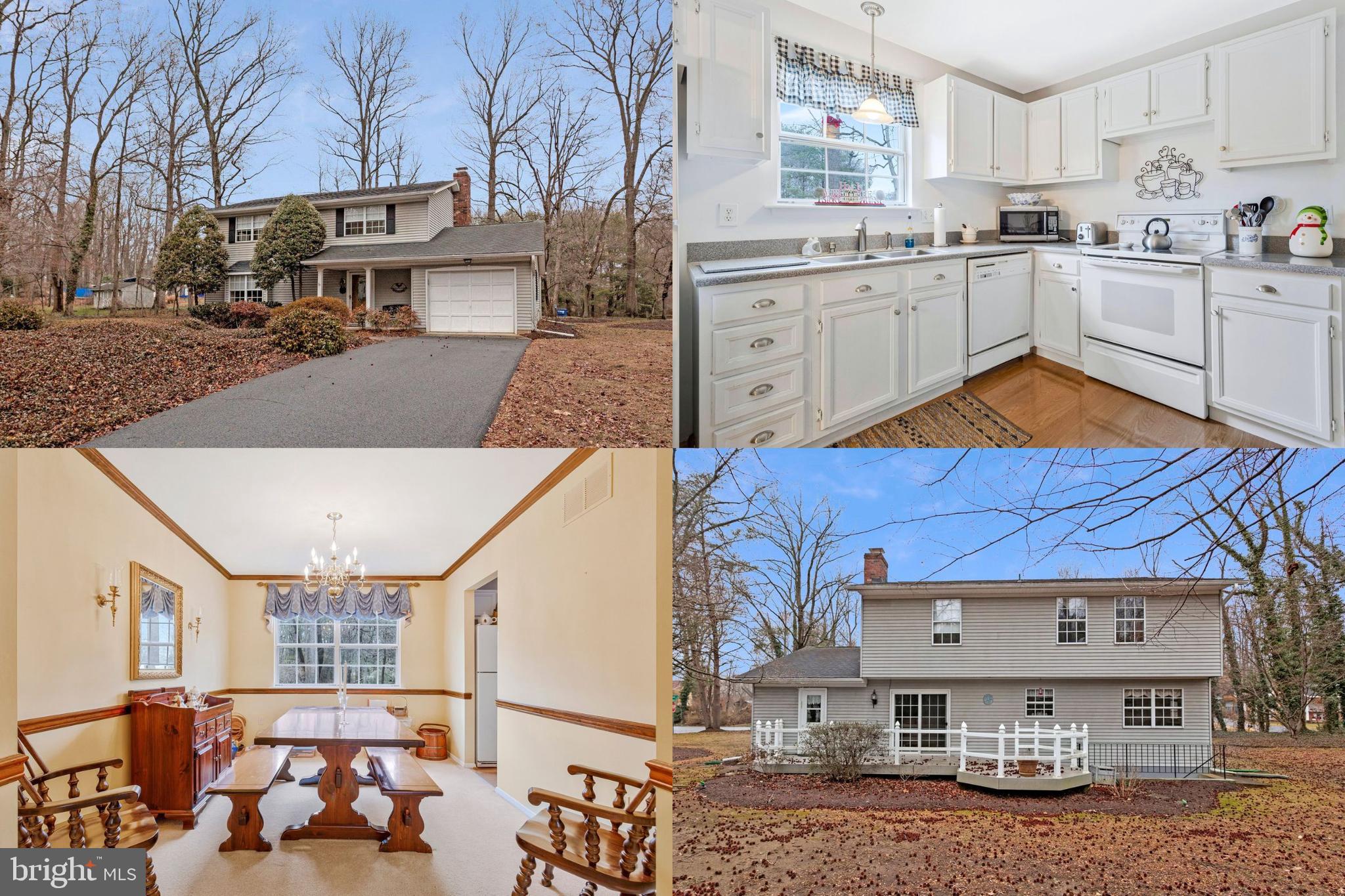 a kitchen that has a lot of cabinets and a sink
