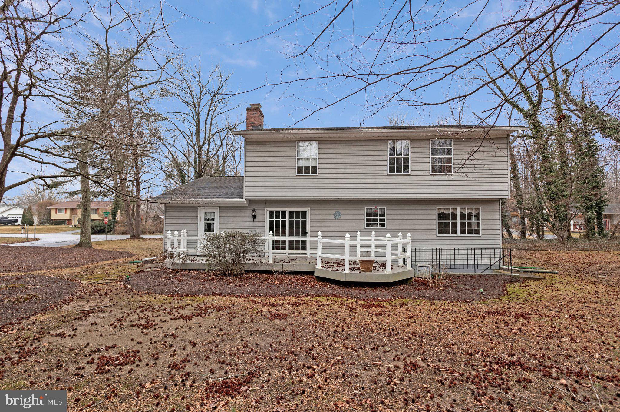 120 Claiborne Road Edgewater, MD 21037 - Photo 13 of 16 a front view of a house with a yard