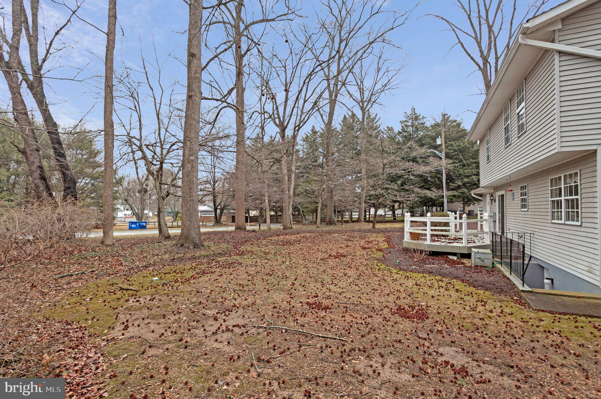 120 Claiborne Road Edgewater, MD 21037 - Photo 14 of 16 a backyard of a house with lots of green space