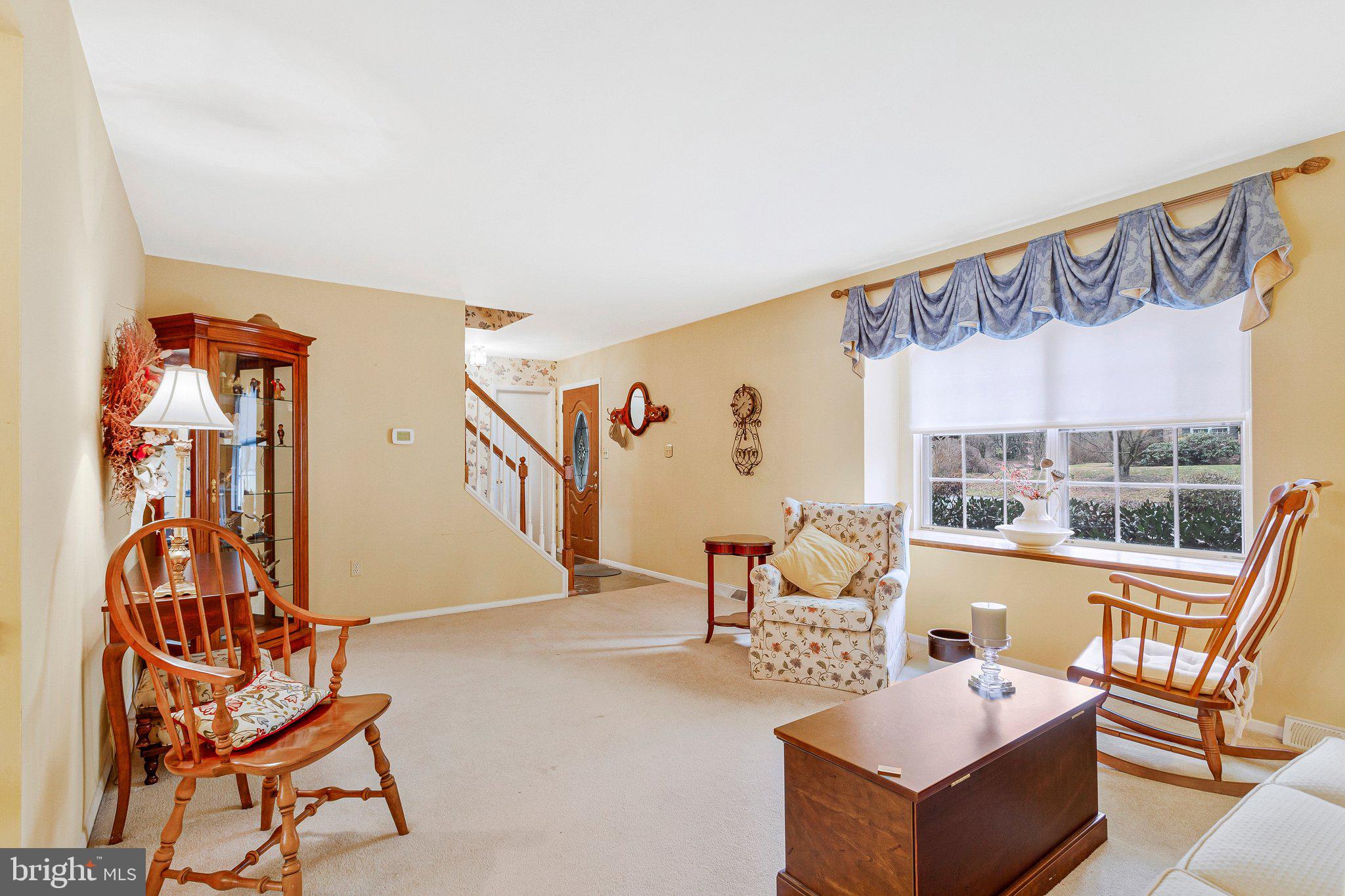 120 Claiborne Road Edgewater, MD 21037 - Photo 2 of 16 a living room with furniture and a large window
