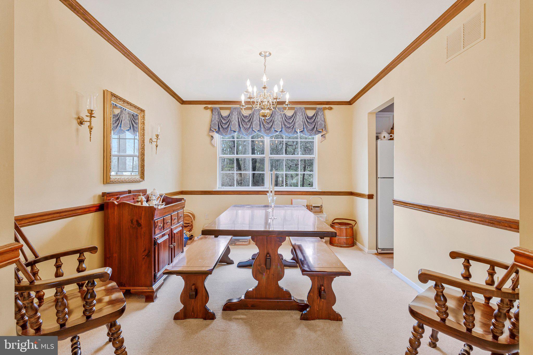 120 Claiborne Road Edgewater, MD 21037 - Photo 3 of 16 a living room with furniture and a chandelier