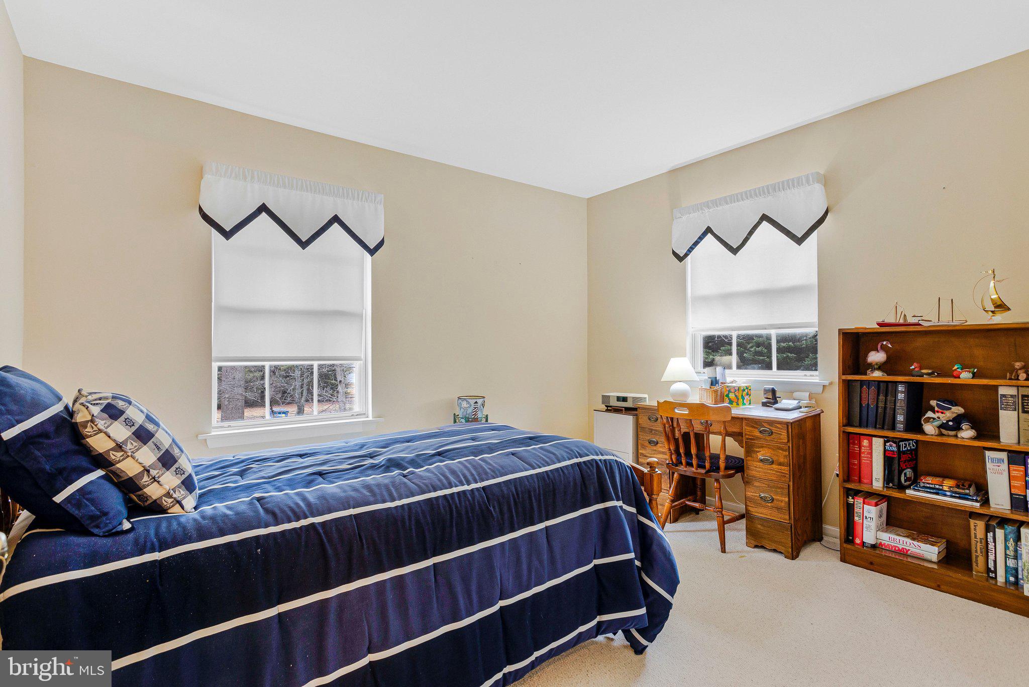 120 Claiborne Road Edgewater, MD 21037 - Photo 10 of 16 a bedroom with furniture and a wooden floor