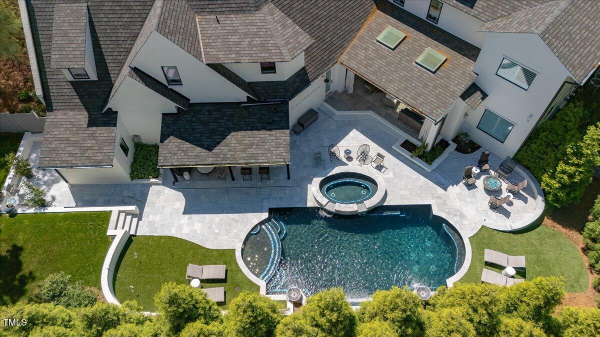 1208 Hunting Ridge Road Raleigh, NC 27615 - Photo 67 of 71 an aerial view of a house with outdoor space