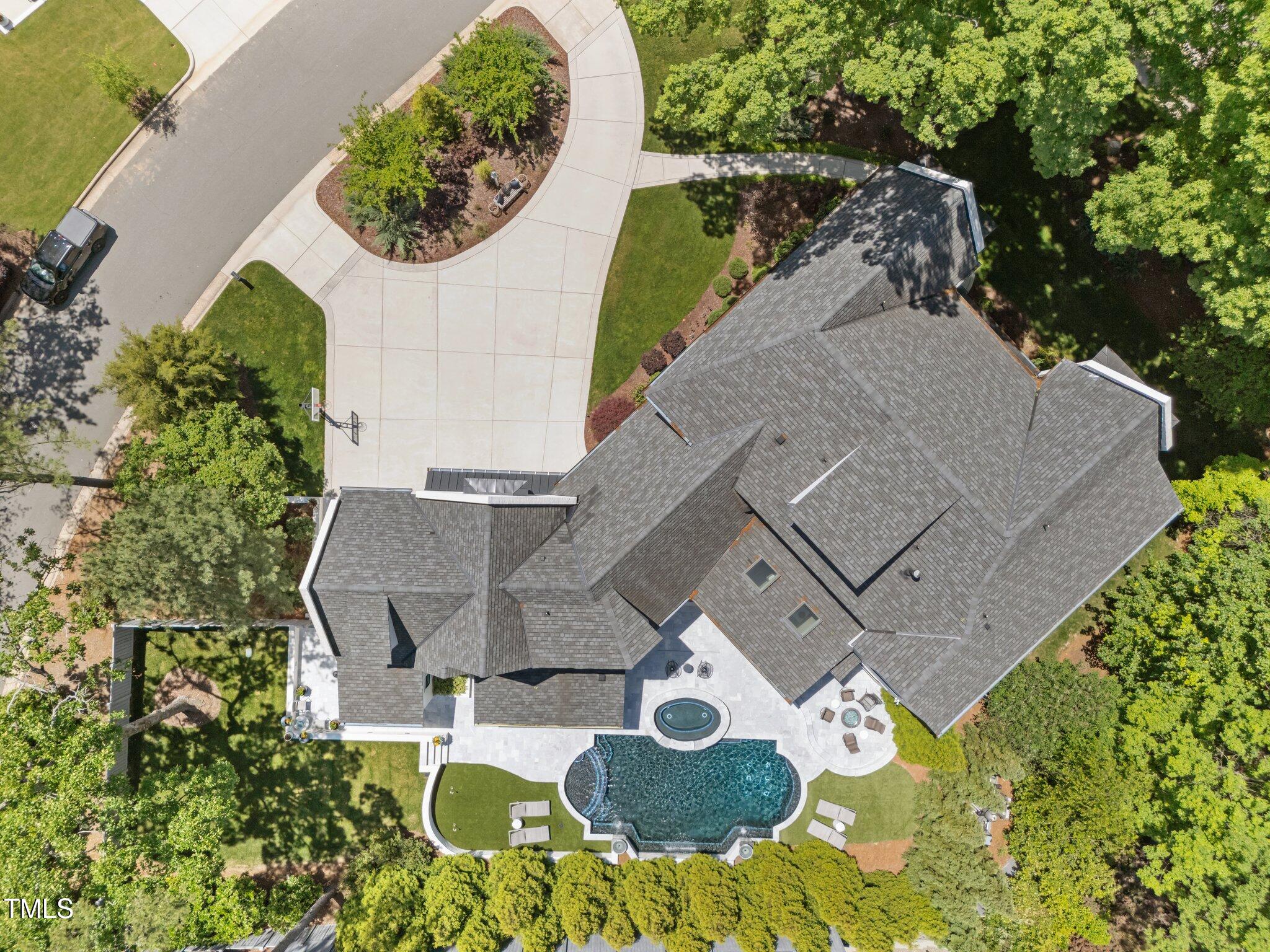 1208 Hunting Ridge Road Raleigh, NC 27615 - Photo 69 of 71 an aerial view of a house with outdoor space