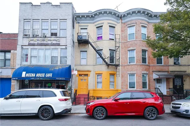 a car parked in front of a building